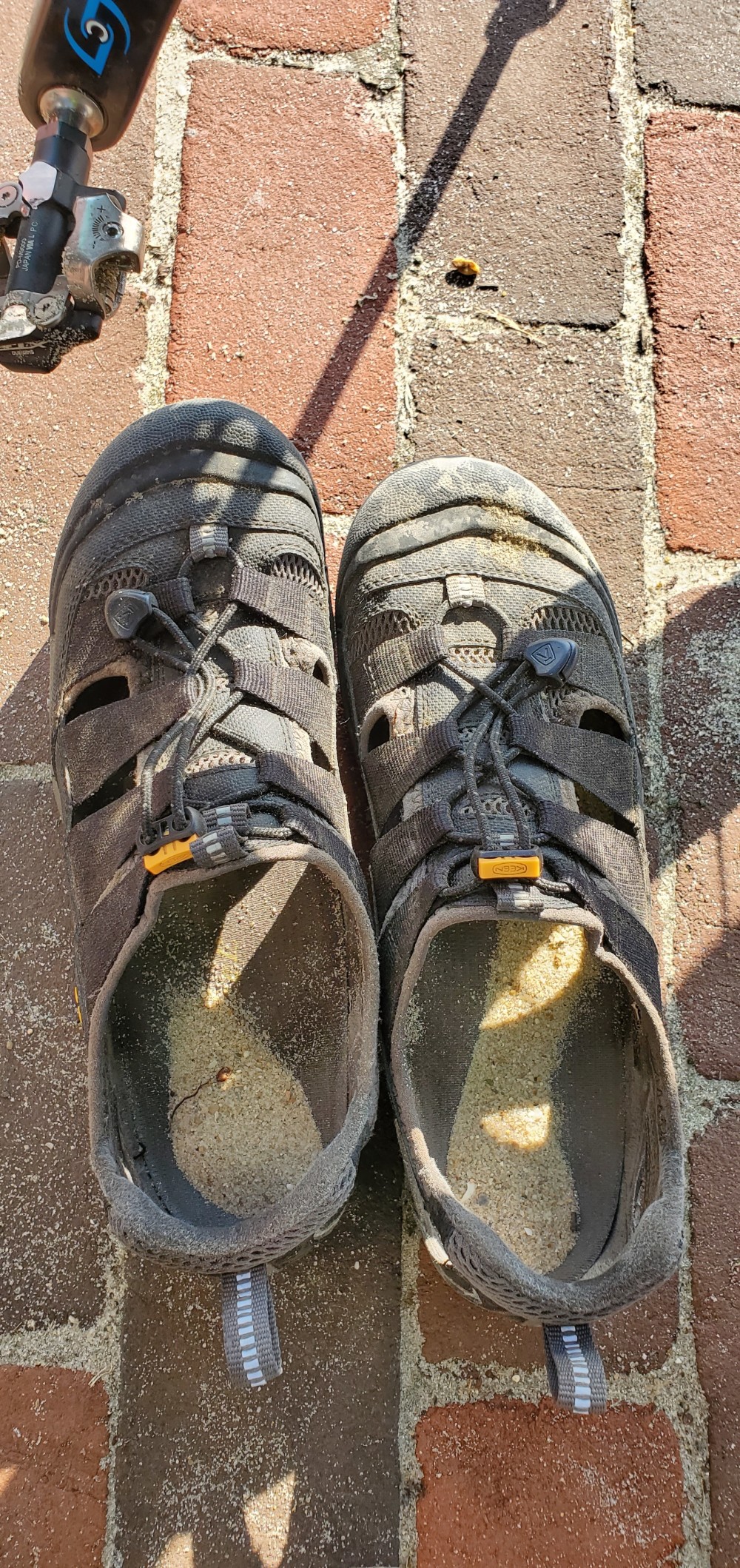 Sand in my sandals after the wheel-dipping ceremony.