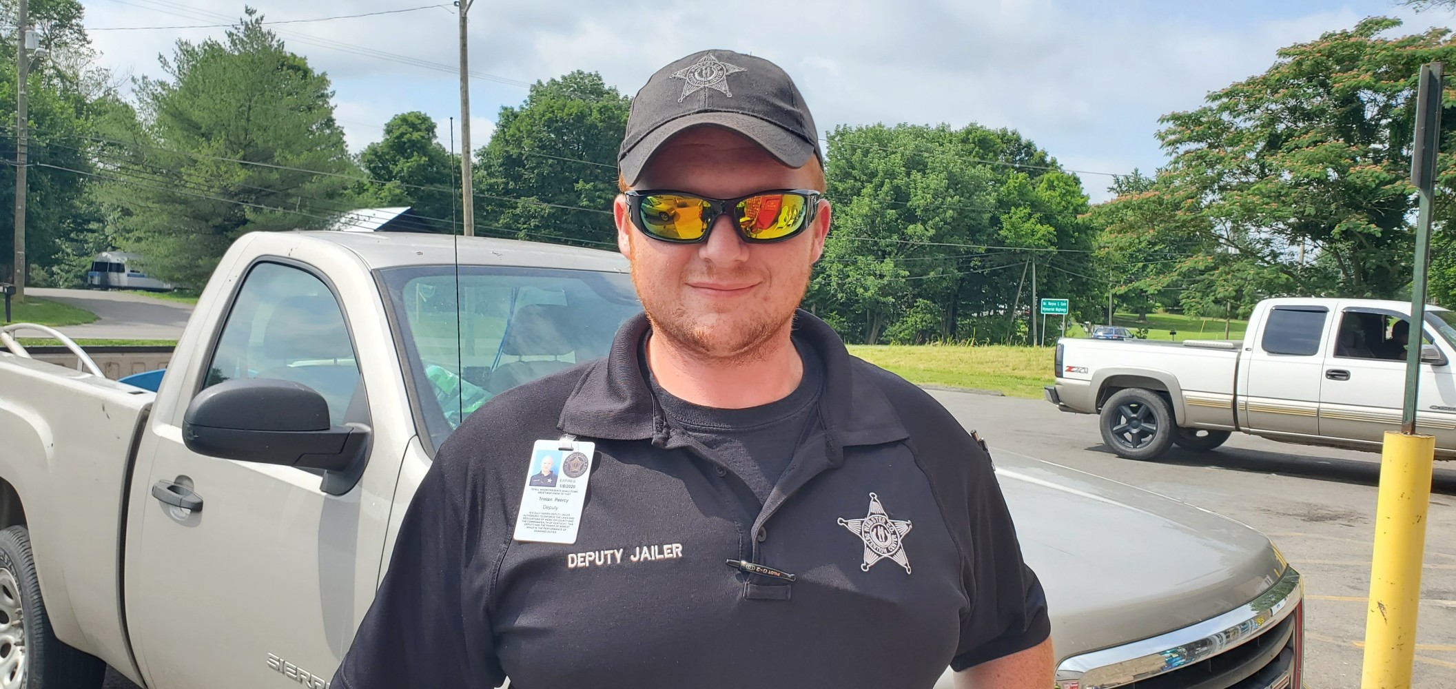 Deputy Tristan greeted me outside Dollar General (this one had fruit!).