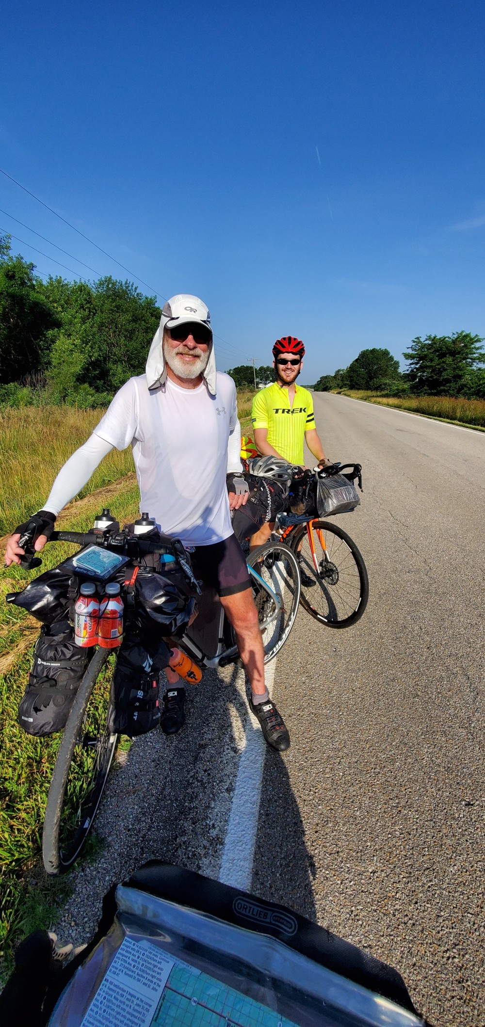Unfortunately, I forgot his name, but the guy in white lives on Whidbey Island, and is on his way to Yorktown. The guy in the yellow Trek jersey is the last TransAm racer - Adam Bendinsky (https://www.facebook.com/adam.bendinsky).