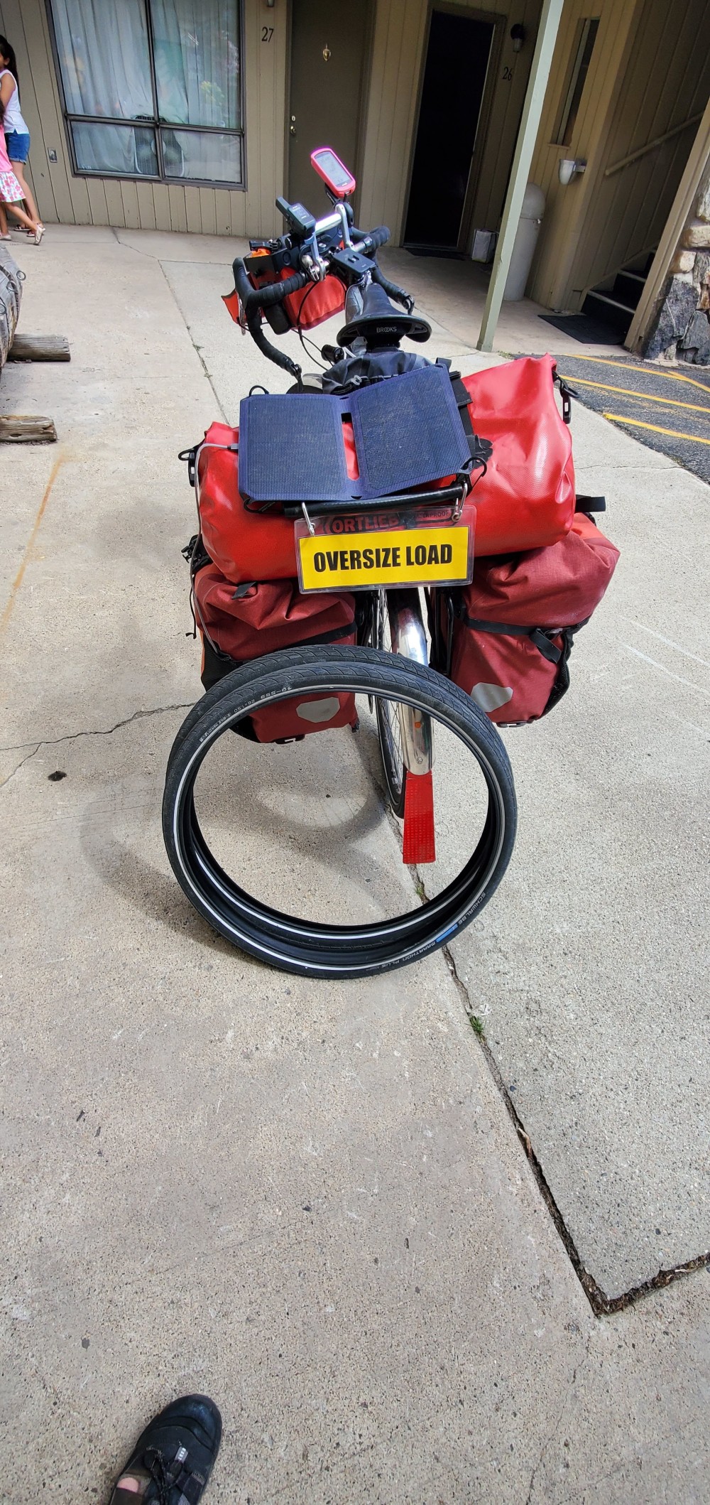 I ordered a set of my favorite touring tires (Schwalbe Marathon Plus) and had them delivered to Pioneer Sports in Frisco and changed them in the parking lot. 3,200 miles, with no flats, on a loaded bike seems pretty awesome to me. Also, my Mini Morph pump kicks butt!