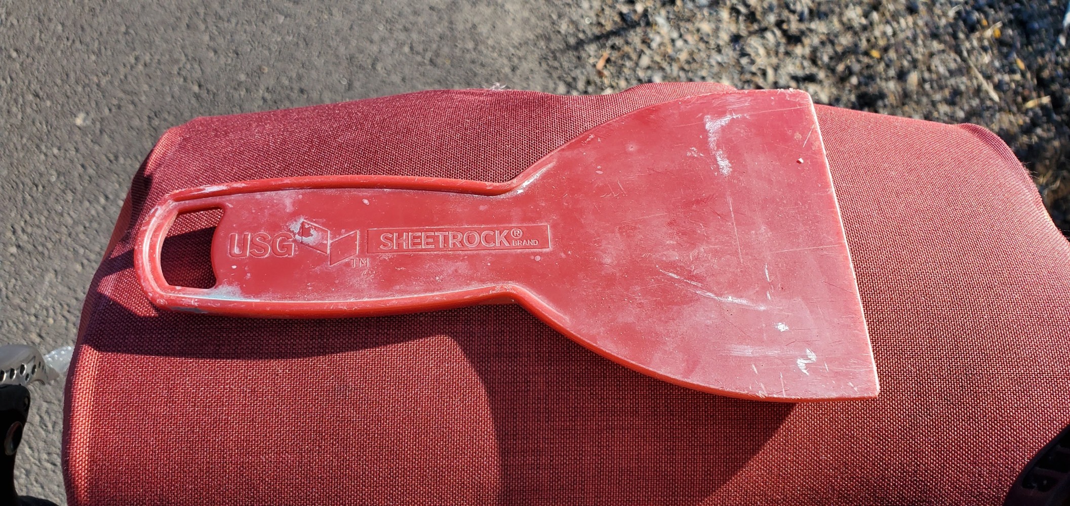 Tool find number one: Drywall putty knife.