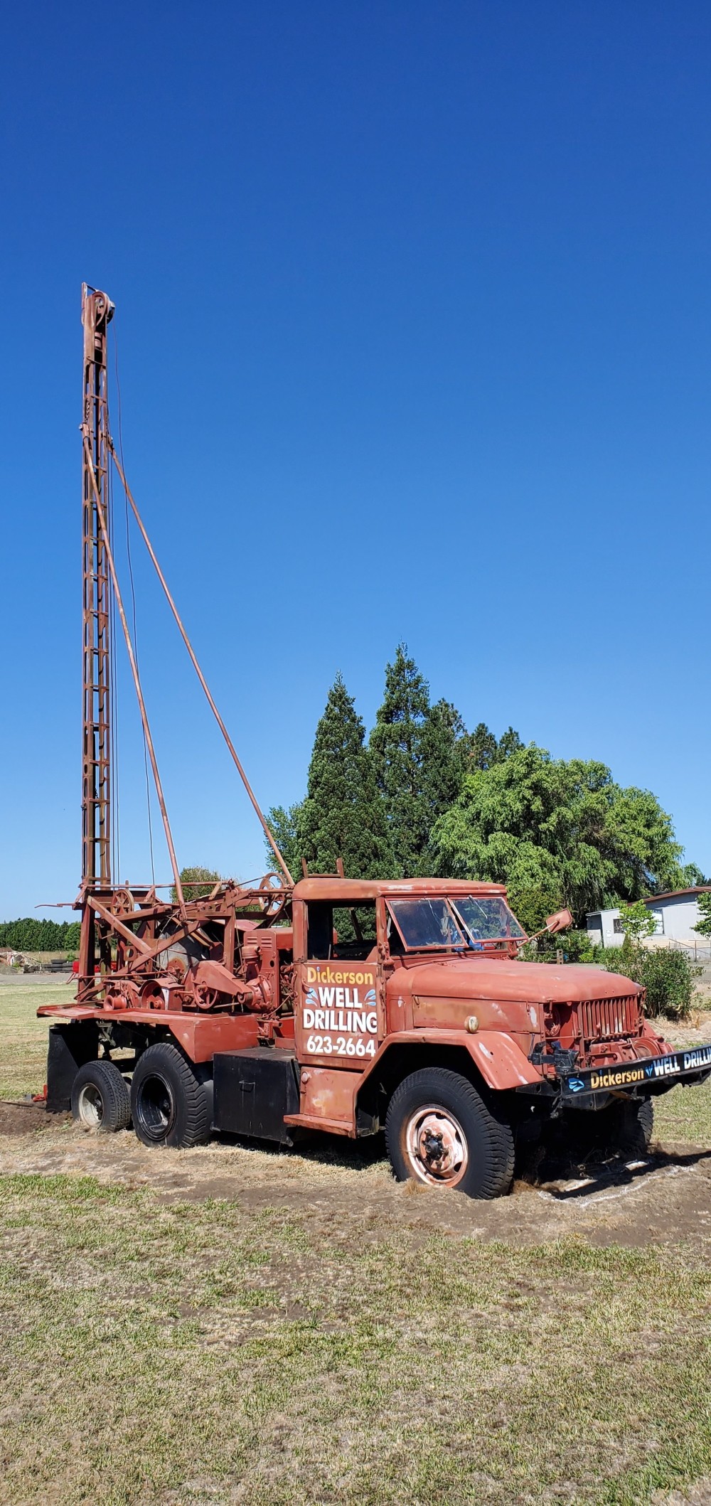 I liked this old drilling truck, now an advertisement. I especially like the windshield!