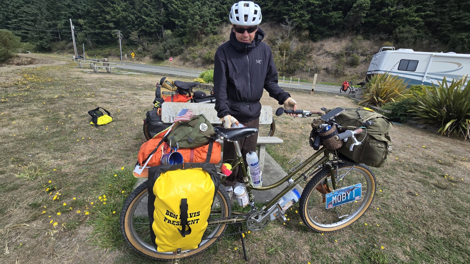 Nick and his Rivendell. His huge handlebar bag is made by Ron's Bikes (https://ronsbikes.com/). I like it, but I think you kind of need to build the bike around it!