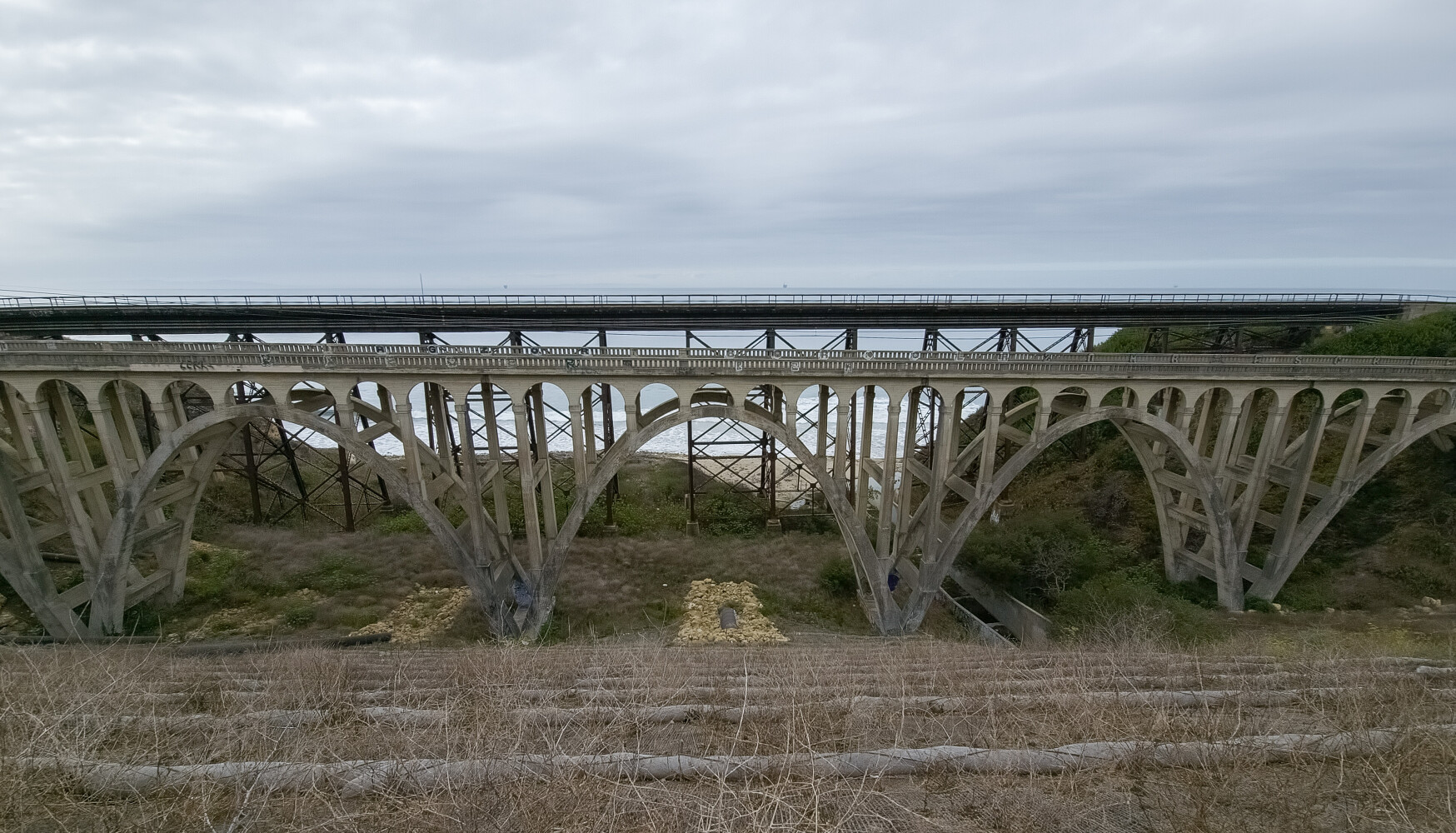 The Arroyo Hondo Old Highway 101 bridge with the railroad trestle behind it.